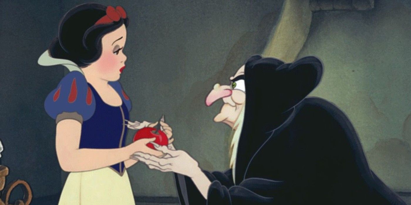 Snow White receiving the poisoned apple in Snow White And The Seven Dwarfs
