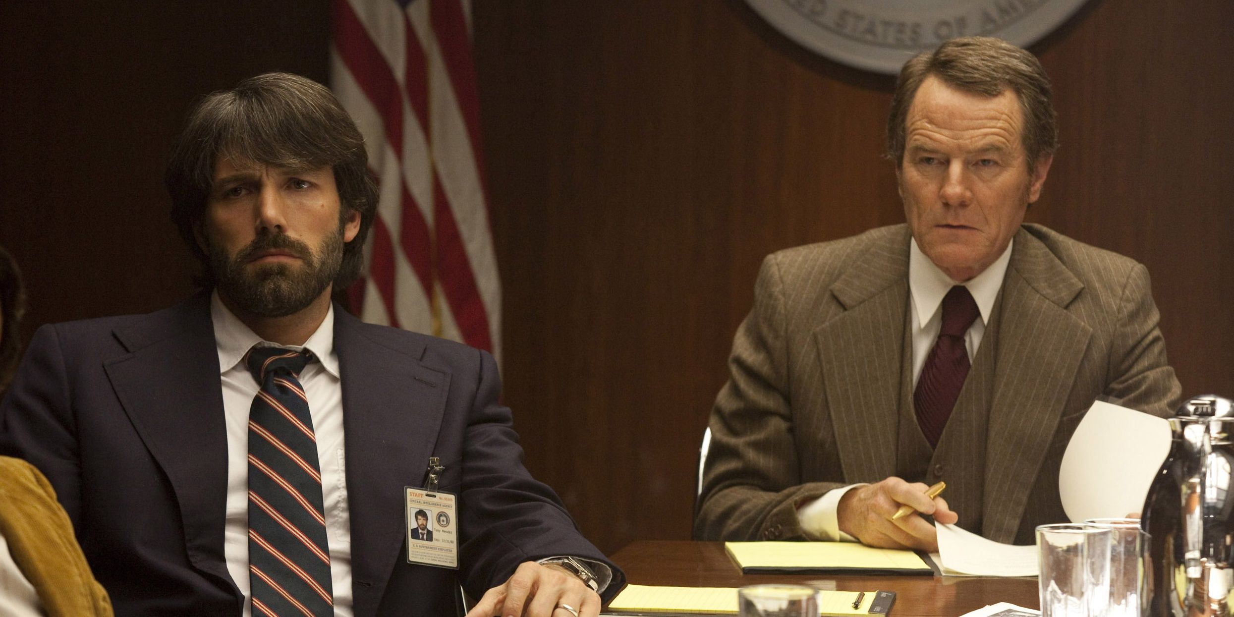 Affleck and Cranston in Argo sat at boardroom table
