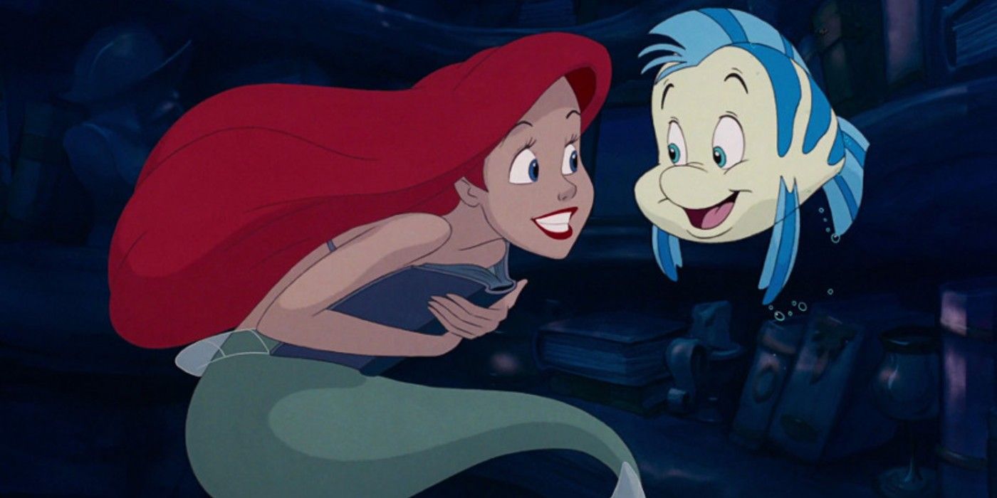 Ariel smiles and speaks with Flounder