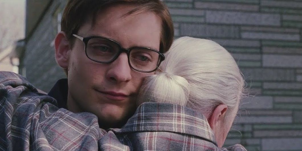Aunt May hugs Peter in Spider-Man 2