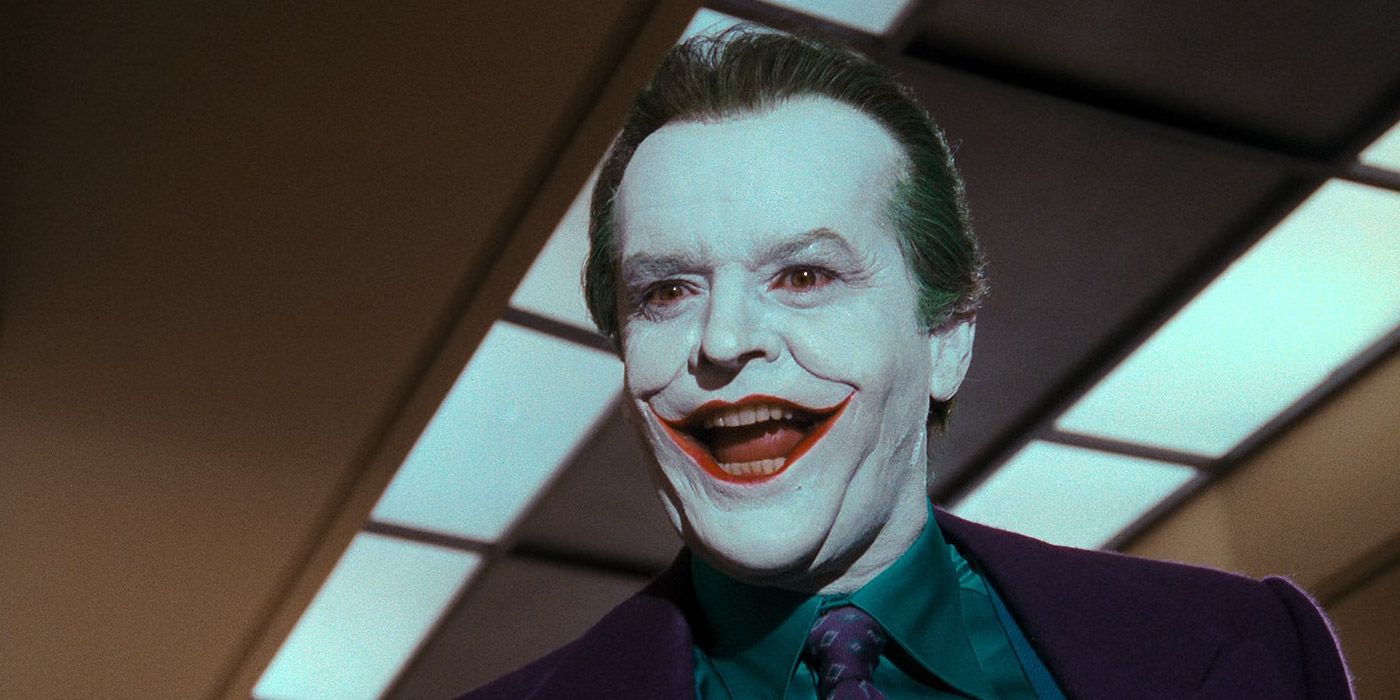 The Joker cracks a joke at Bruce Wayne in Batman