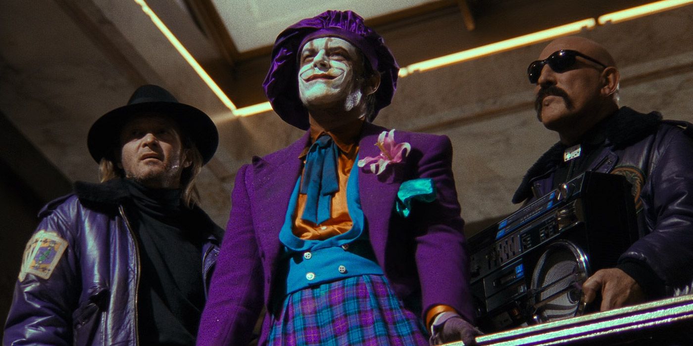 The Joker and his goons at an art museum in Batman