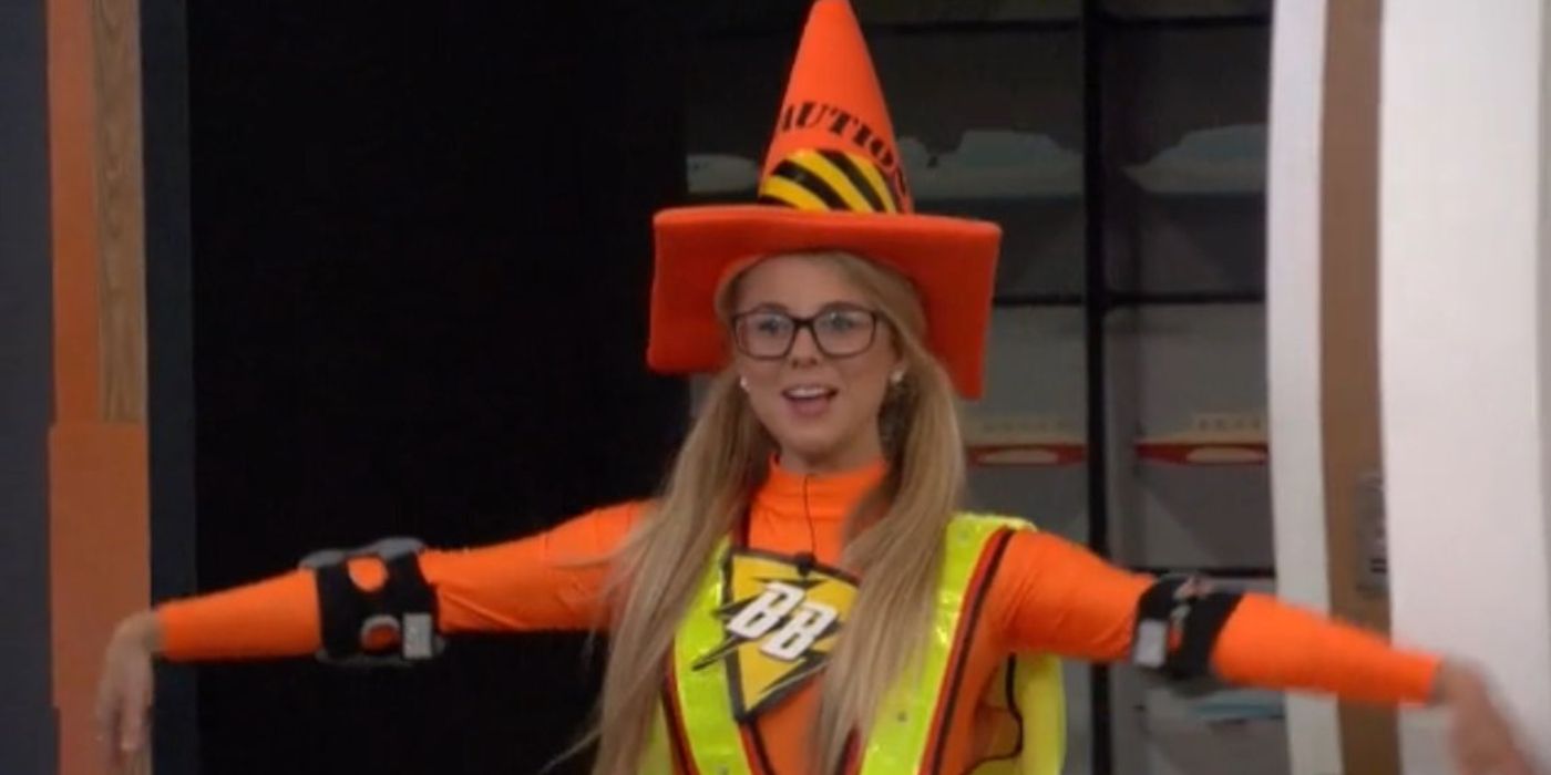 Nicole wearing an orange cone costume from Big Brother.