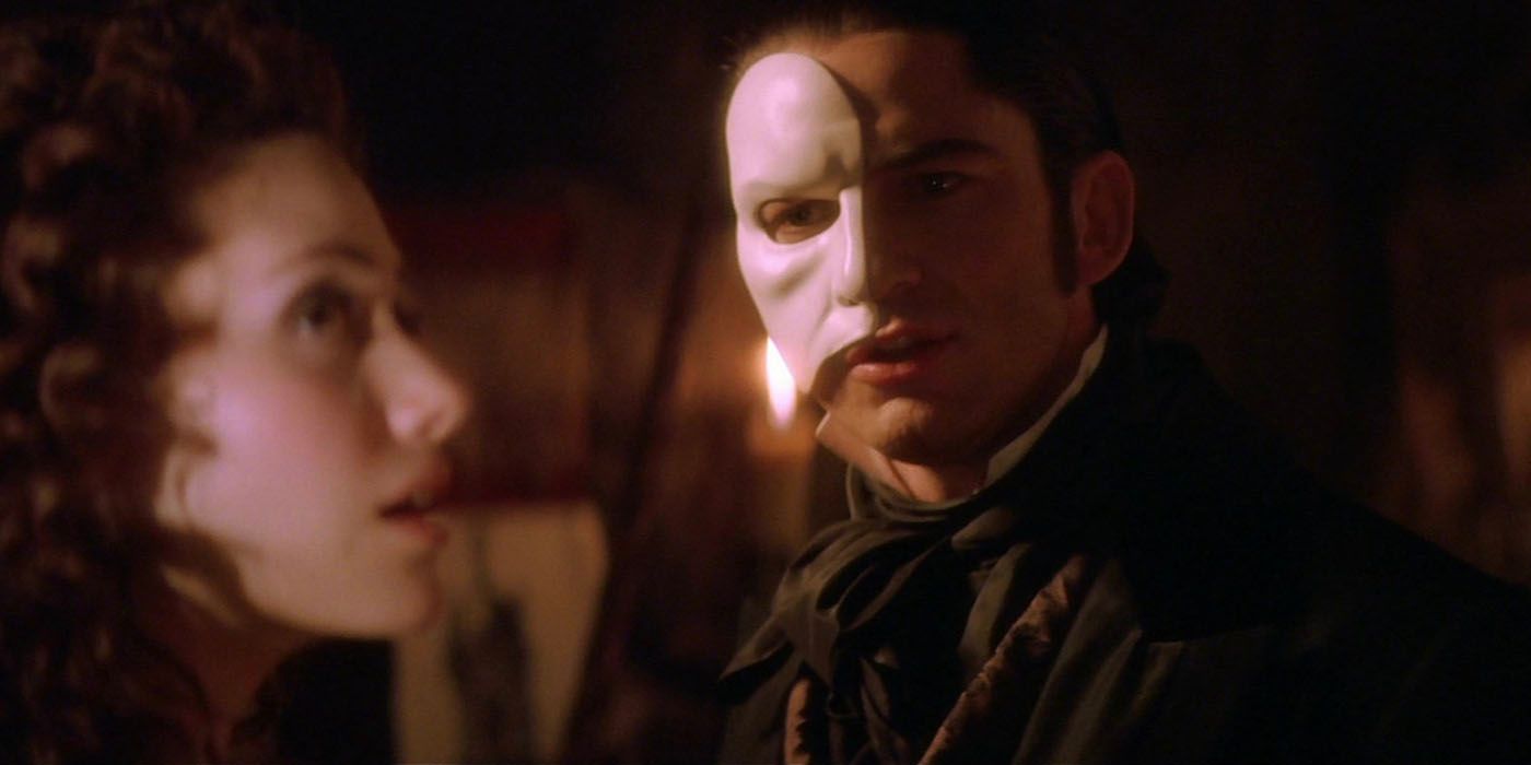 Gerard Butler looks at Emmy Rossum in The Phantom Of The Opera