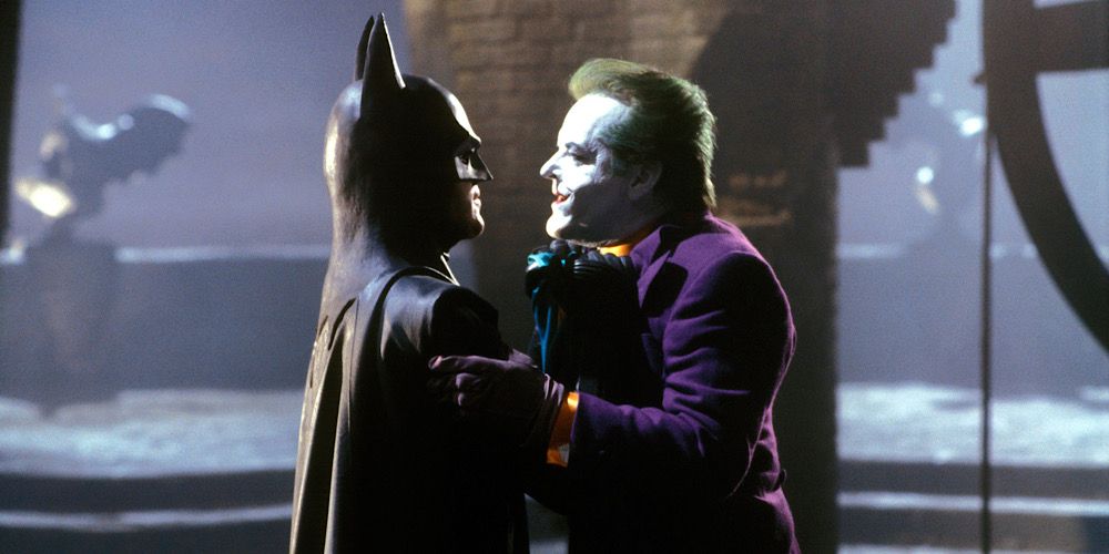 Batman and Joker squaring up to each other in the cathedral in Batman