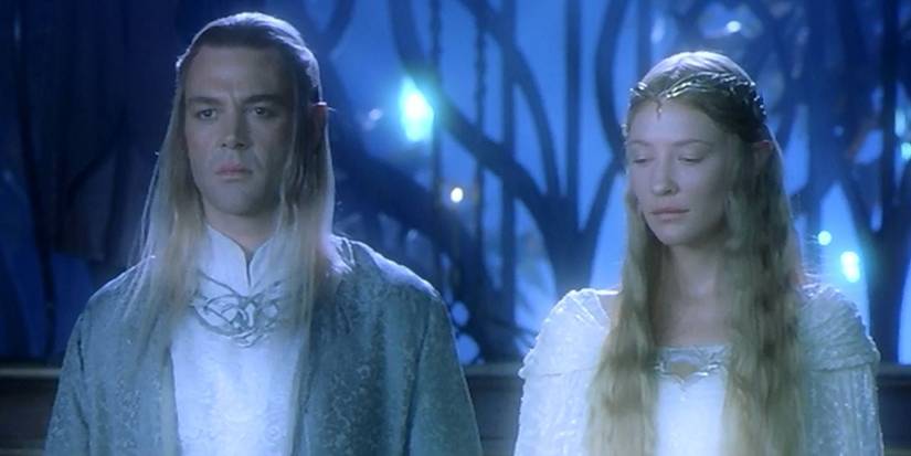 Celeborn (Marton Csokas) and Galadriel (Cate Blanchett) standing together in Lothlorien in The Lord of the Rings.
