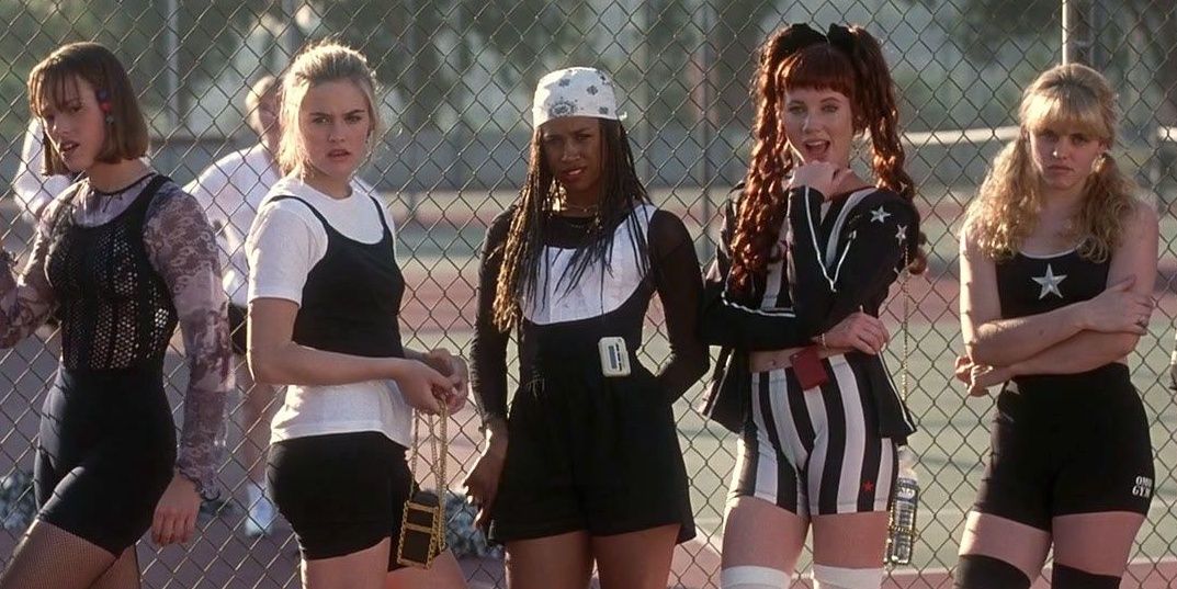 Cher (Alicia Silverstone), Dionne (Stacey Dash) and cast in gym class scene in &quot;Clueless.&quot;