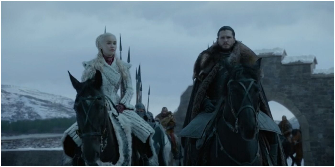Daenerys Targaryen and Jon Snow approach Winterfell on horseback.