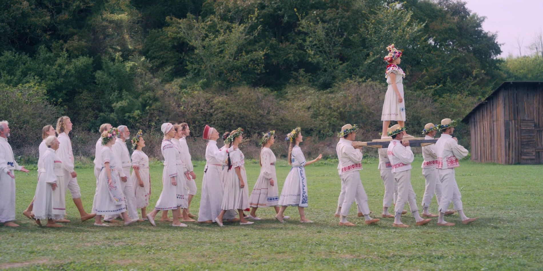 Dani rides as the May Queen in Midsommar