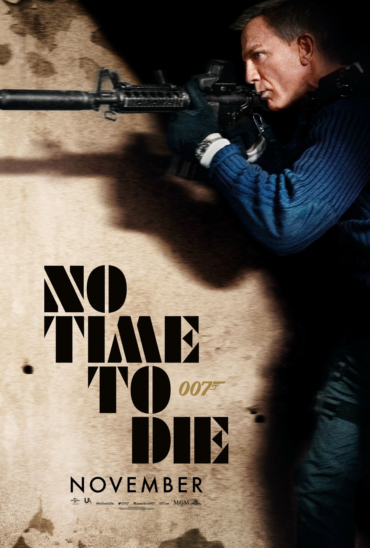 Daniel Craig Holding A Gun In New No Time To Die Poster