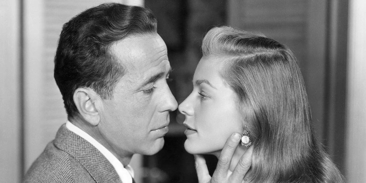 Humphrey Bogary strokes Lauren Bacall's face in Dark Passage.