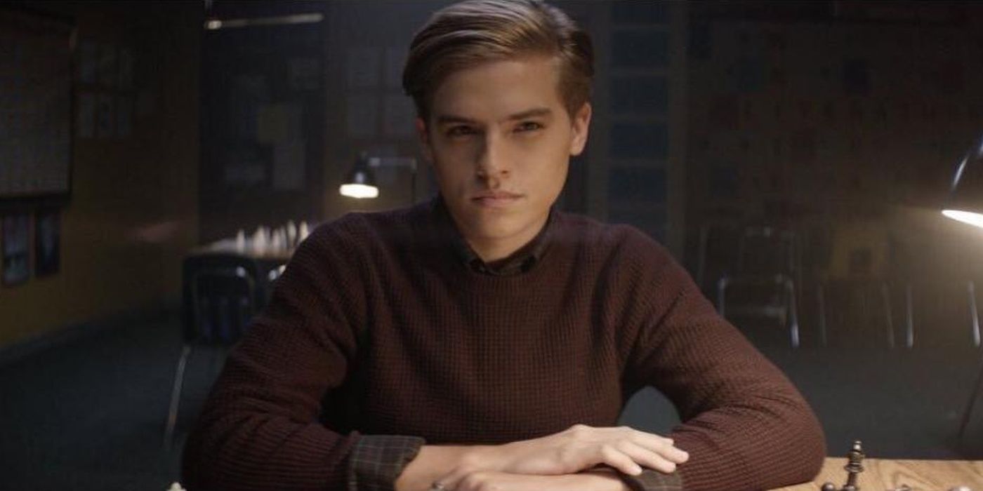 Dylan Sprouse as Lucas Ward in Dismissed, sitting at desk