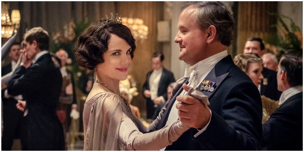 Cora Crawley at ball dancing with Robert in Downton Abbey