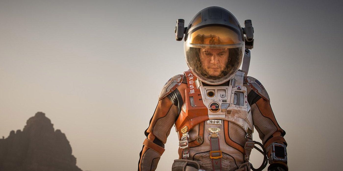Mark Whatney in his astronaut suit walking on Mars in The Martian