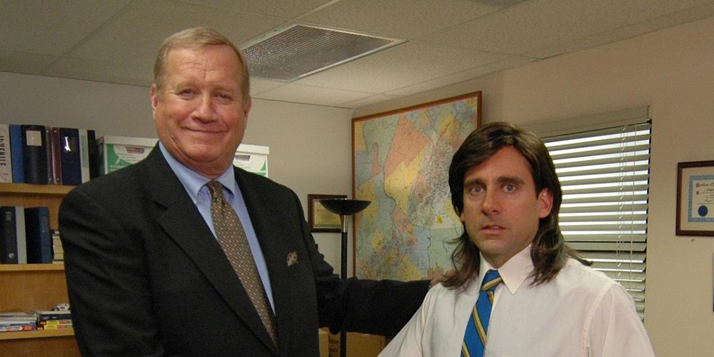 Ed Truck shaking hands with Michael Scott