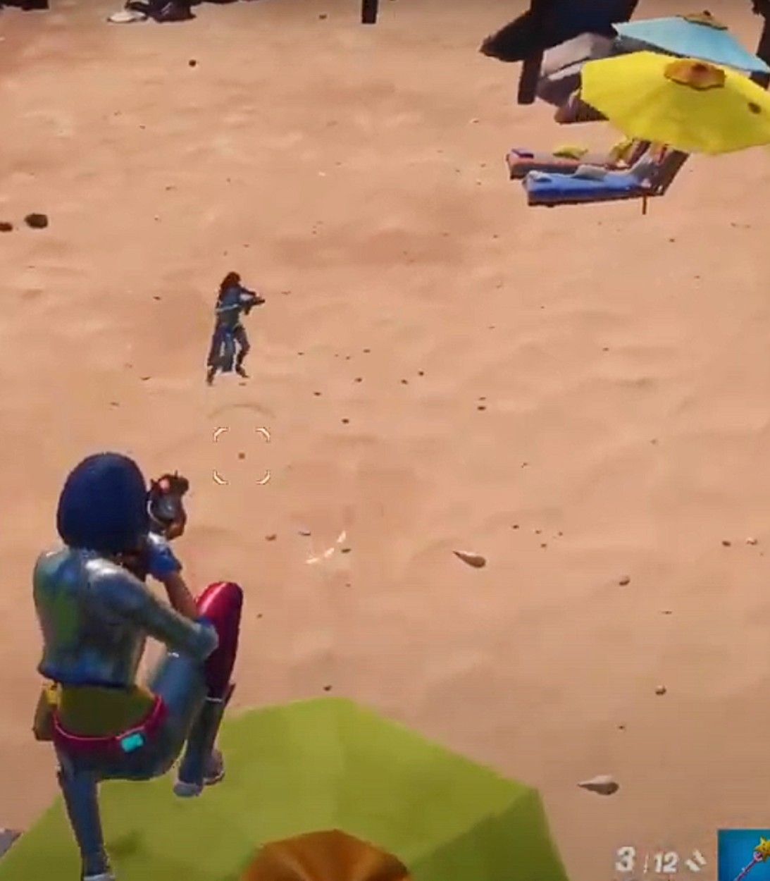 A player bounces on an umbrella and deals damage at Sweaty Sands in Fortnite