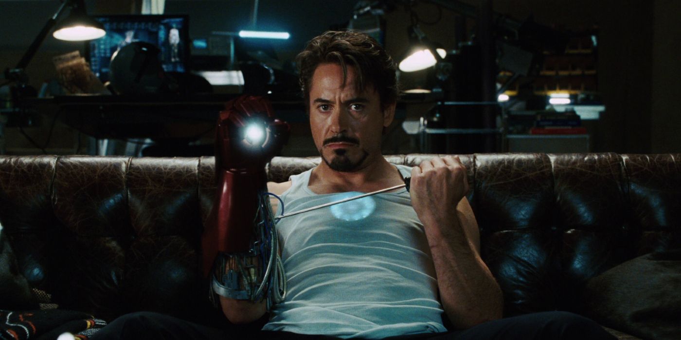 Tony Stark working on his hand armor in Iron Man