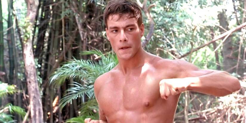 Jean-Claude Van Damme shirtless and practicing martial arts