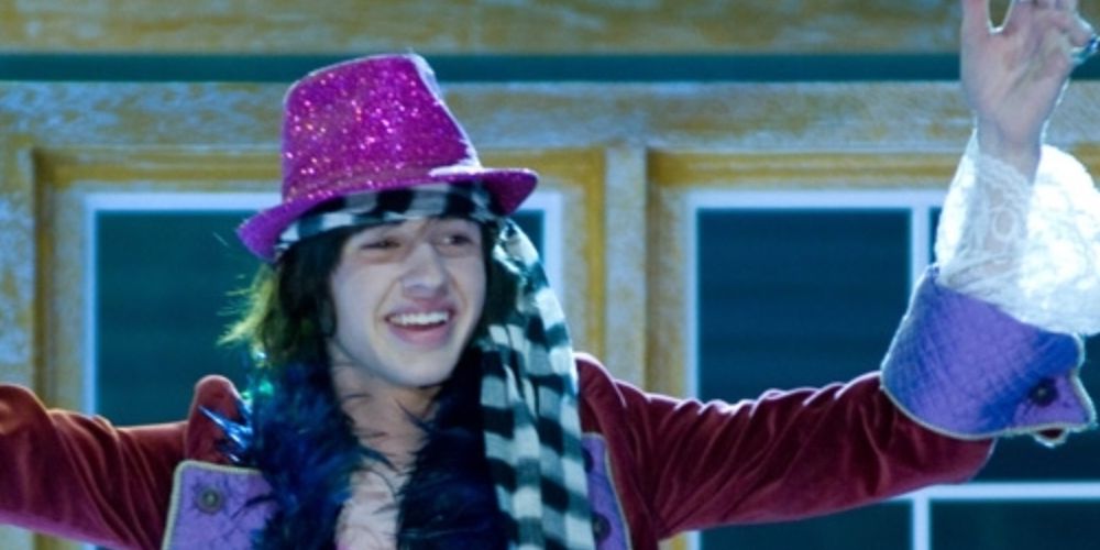 Jimmie Zara in costume on stage in High School Musical 3