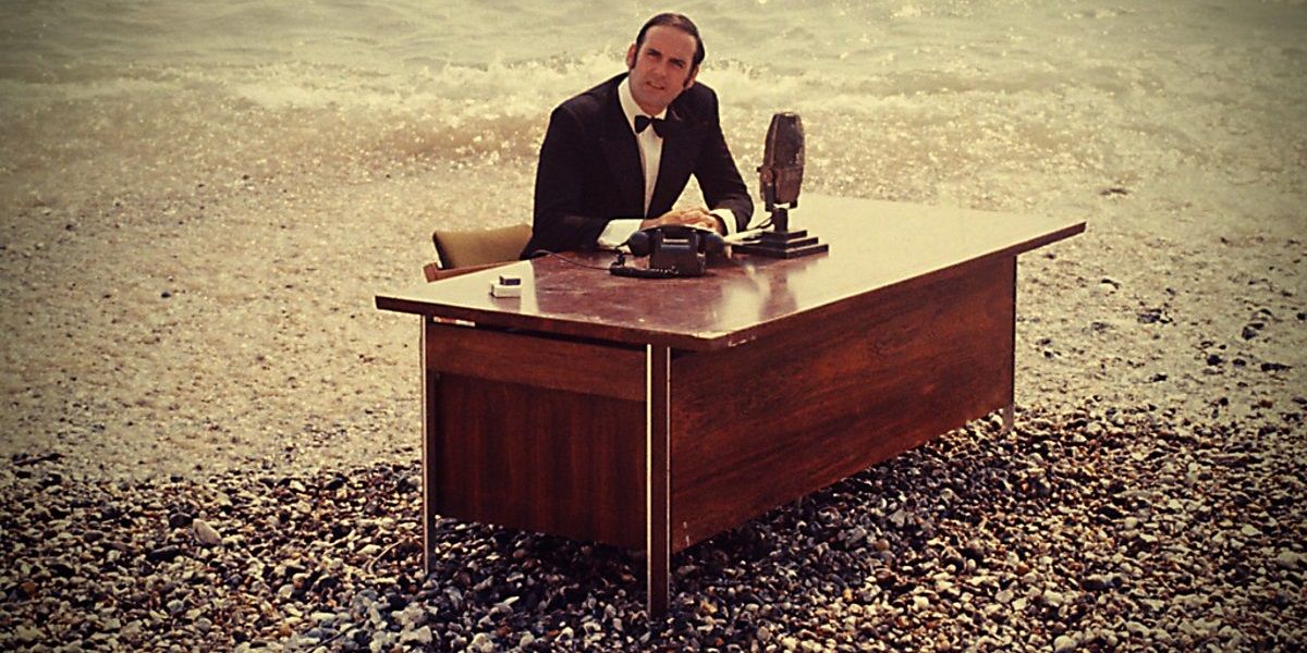 John Cleese as the BBC announcer in Monty Python's Flying Circus