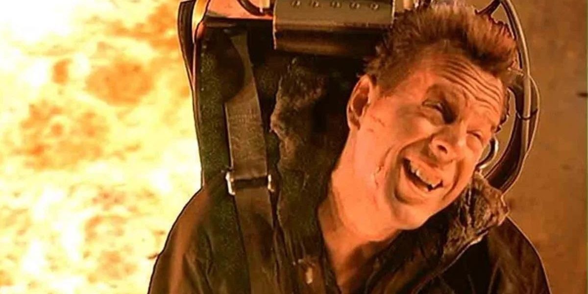 John McClane escapes from an explosion in Die Hard 2