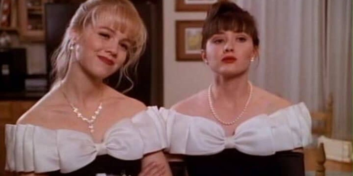 Kelly and Brenda wearing matching dresses in Beverly Hills 90210