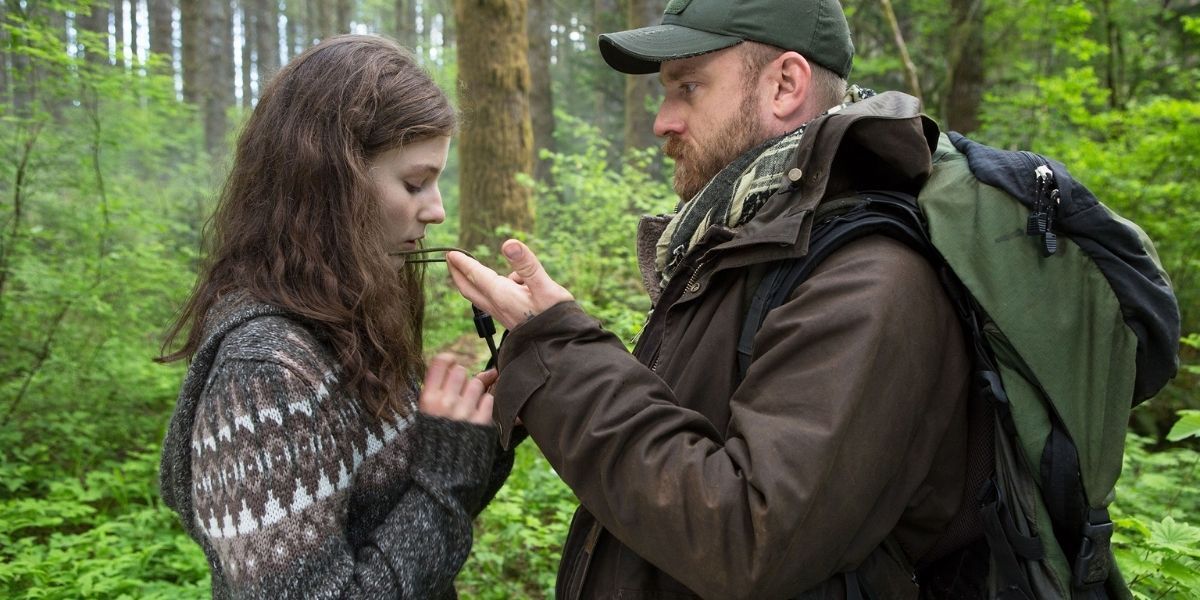 Thomasin McKenzie and Ben Foster in the woods in Leave No Trace