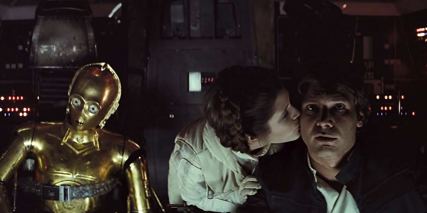 Leia kisses Han after he manages to evade the Imperials in The Empire Strikes Back