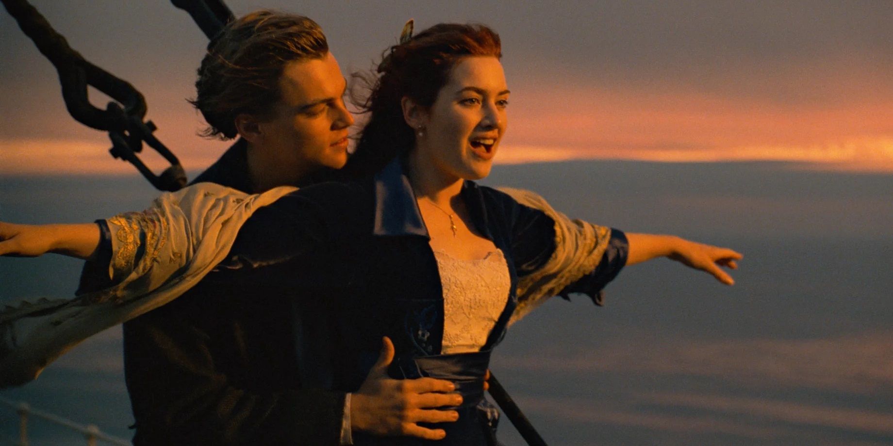 Jack holds Rose at the bow of the ship in Titanic