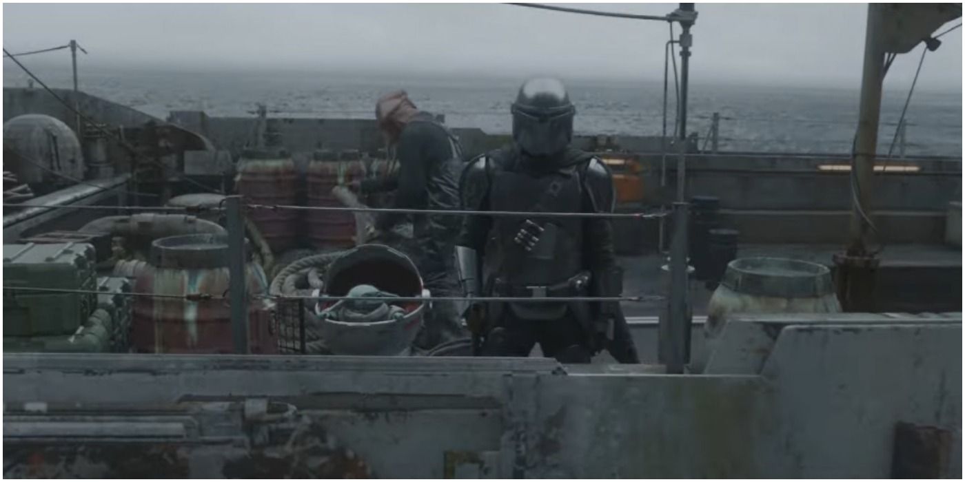 The Mandalorian and The Child on a boat