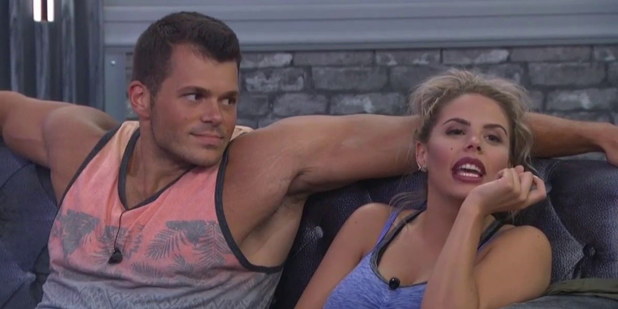 Mark and Elena sitting together on the couch on Big Brother.