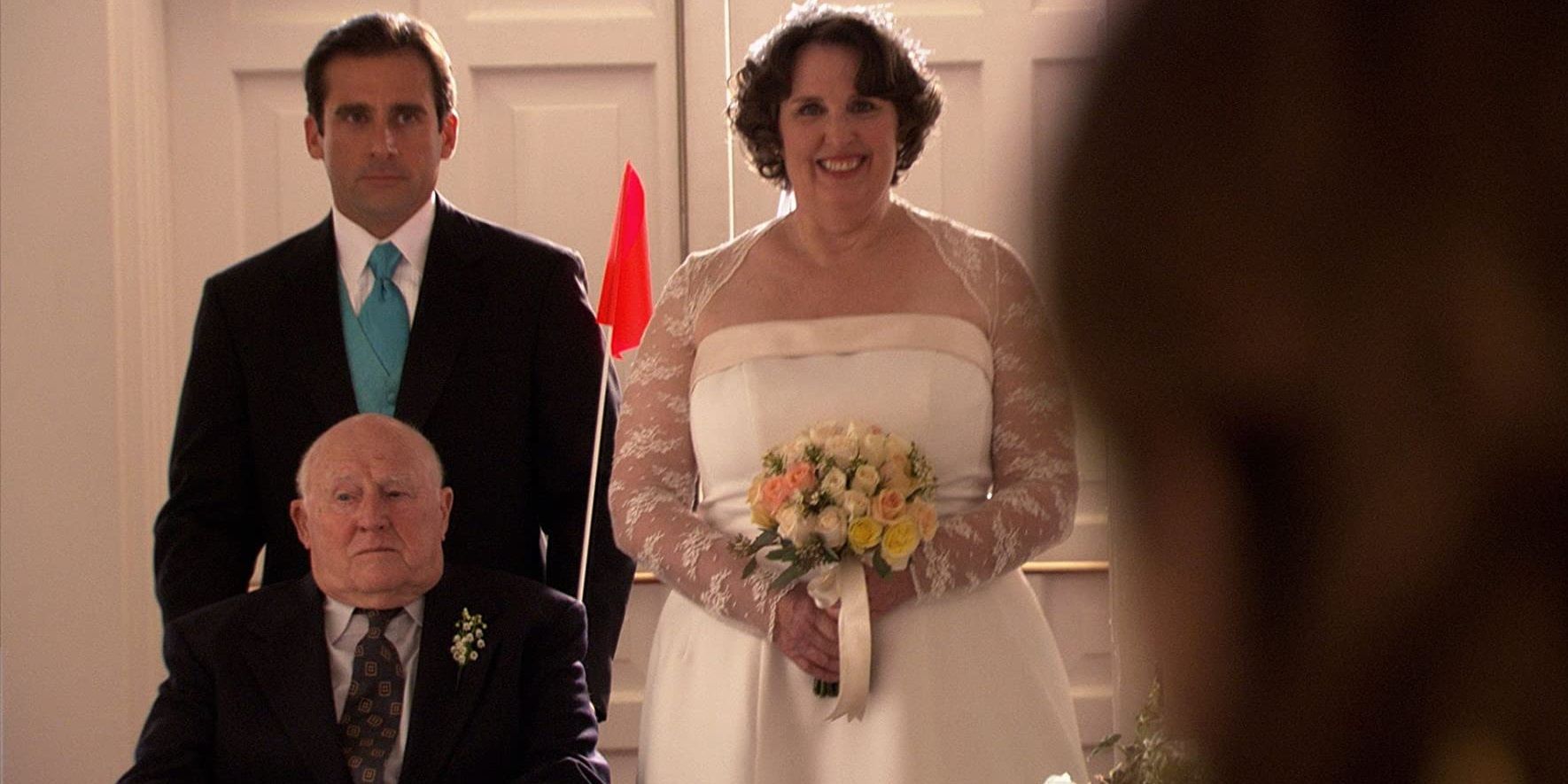 Michael pushes Albert down the aisle with Phyllis in The Office