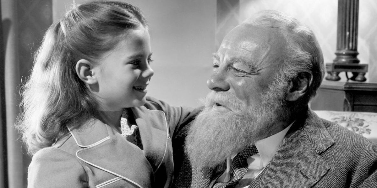 Kris Kringle and Susan smiling at Miracle on 34th Street