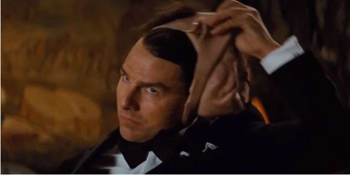 Ethan Hunt pulling off mask