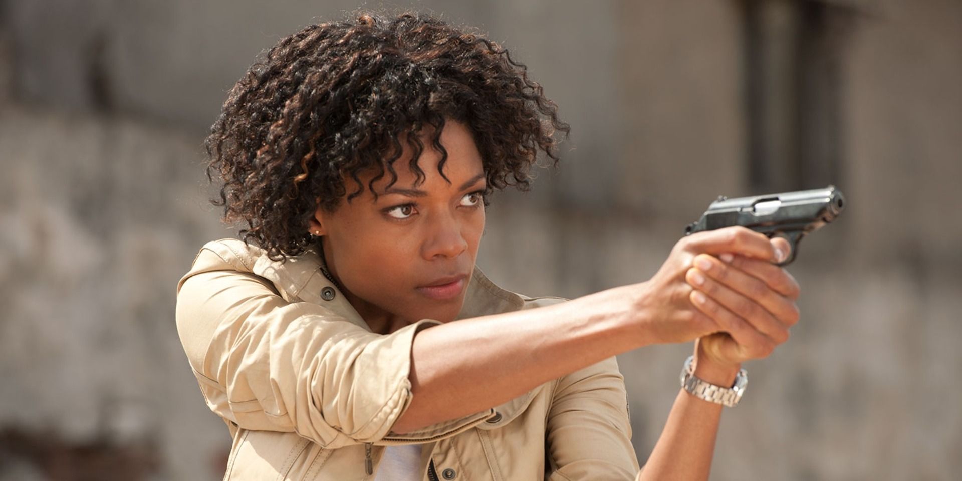 Moneypenny pointing a gun in Skyfall
