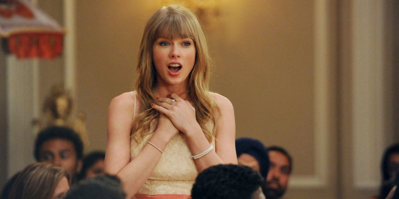 Taylor Swift looking surprised in New Girl 