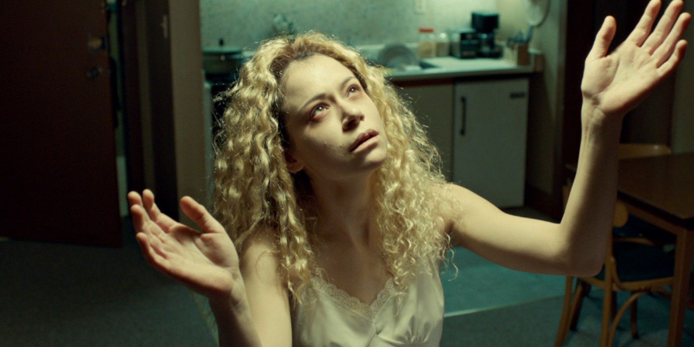 Helena with her arms extended in Orphan Black