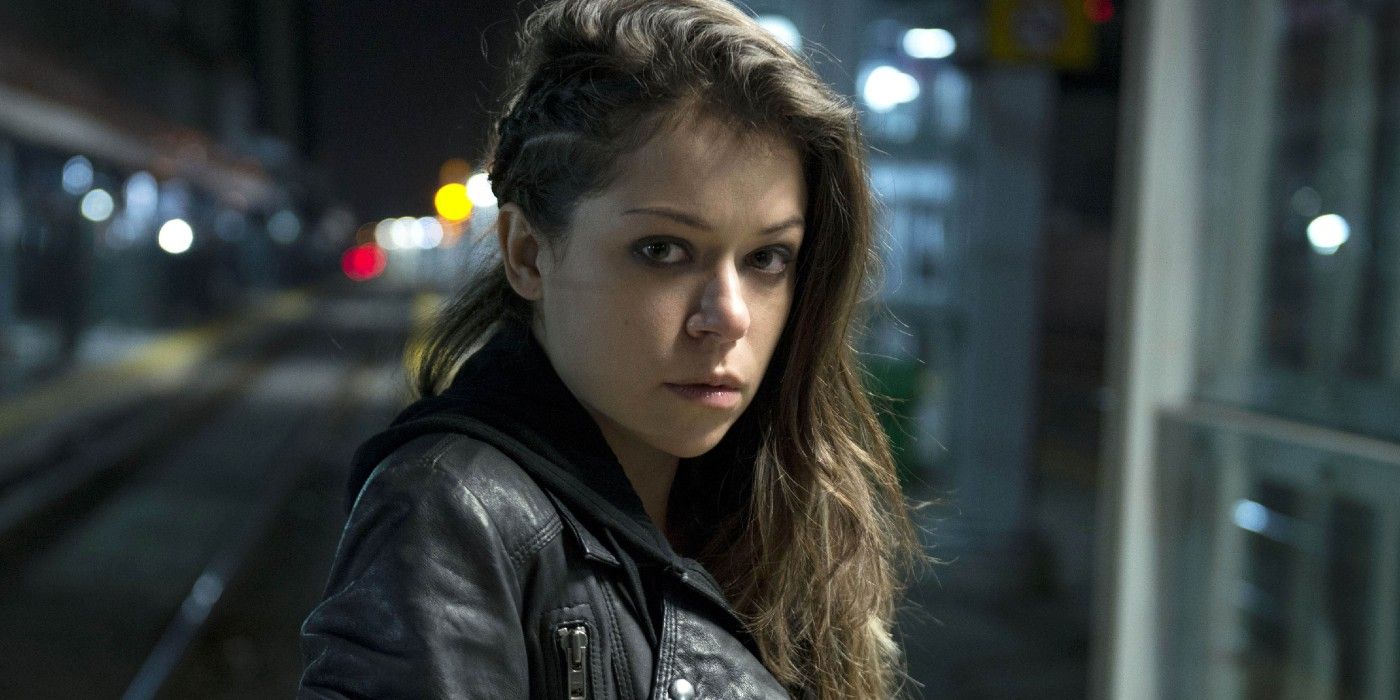 Sarah in a leather jacket on an urban street in Orphan Black