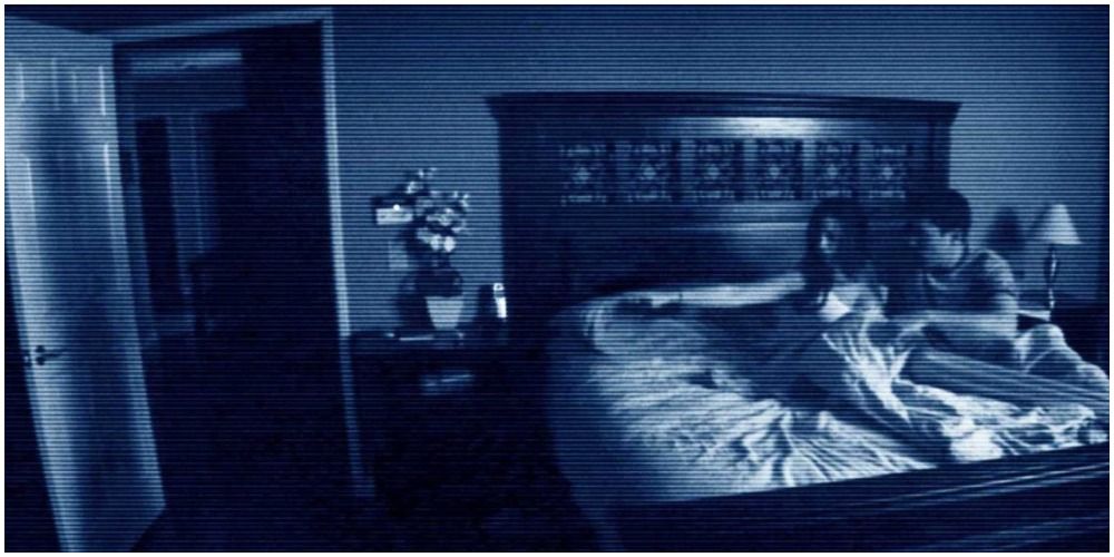 Woman In Bed Pointing At Door