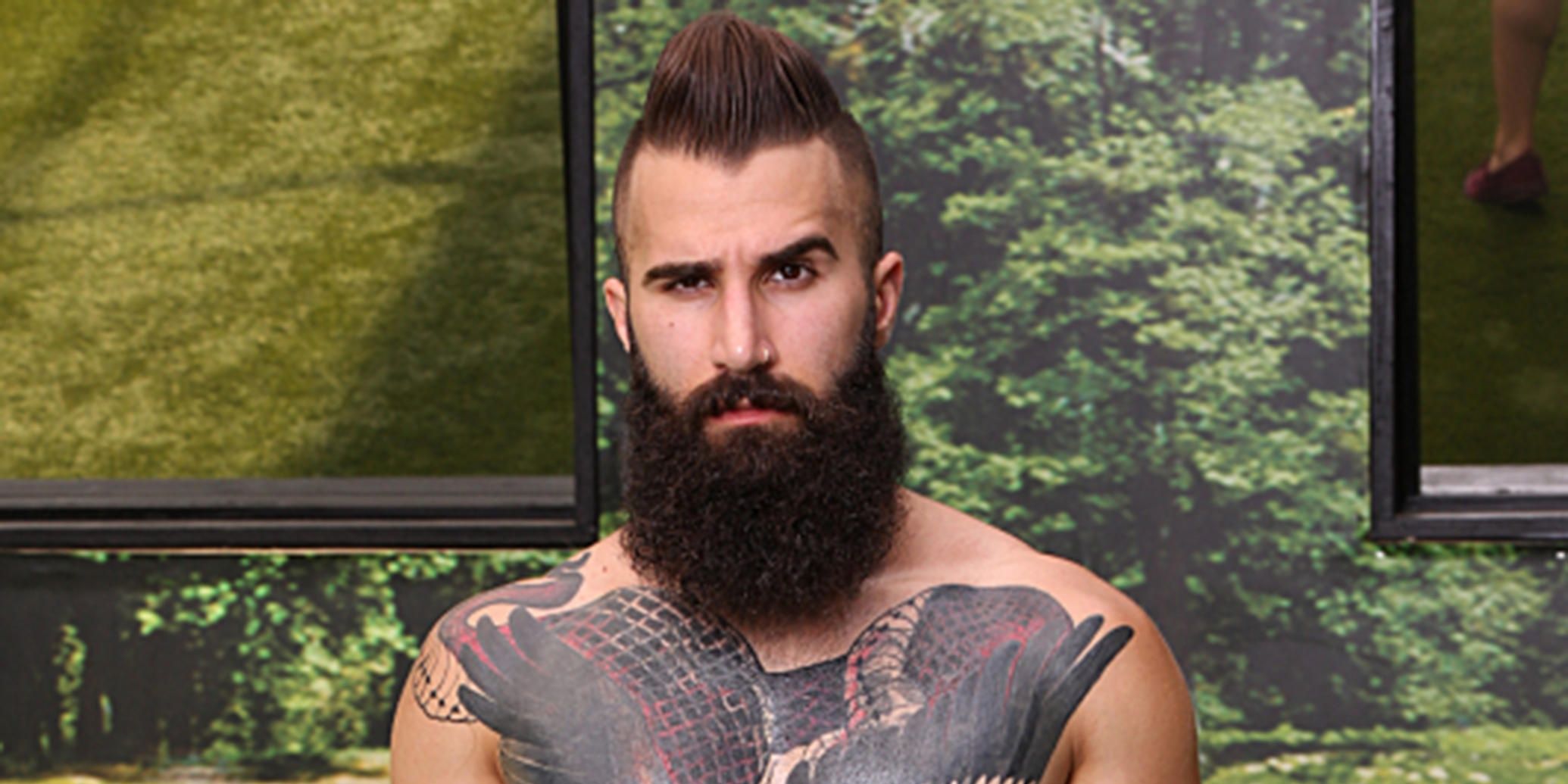 Paul Abrahamian poses with a cocked eyebrown in a Big Brother 18 promo image
