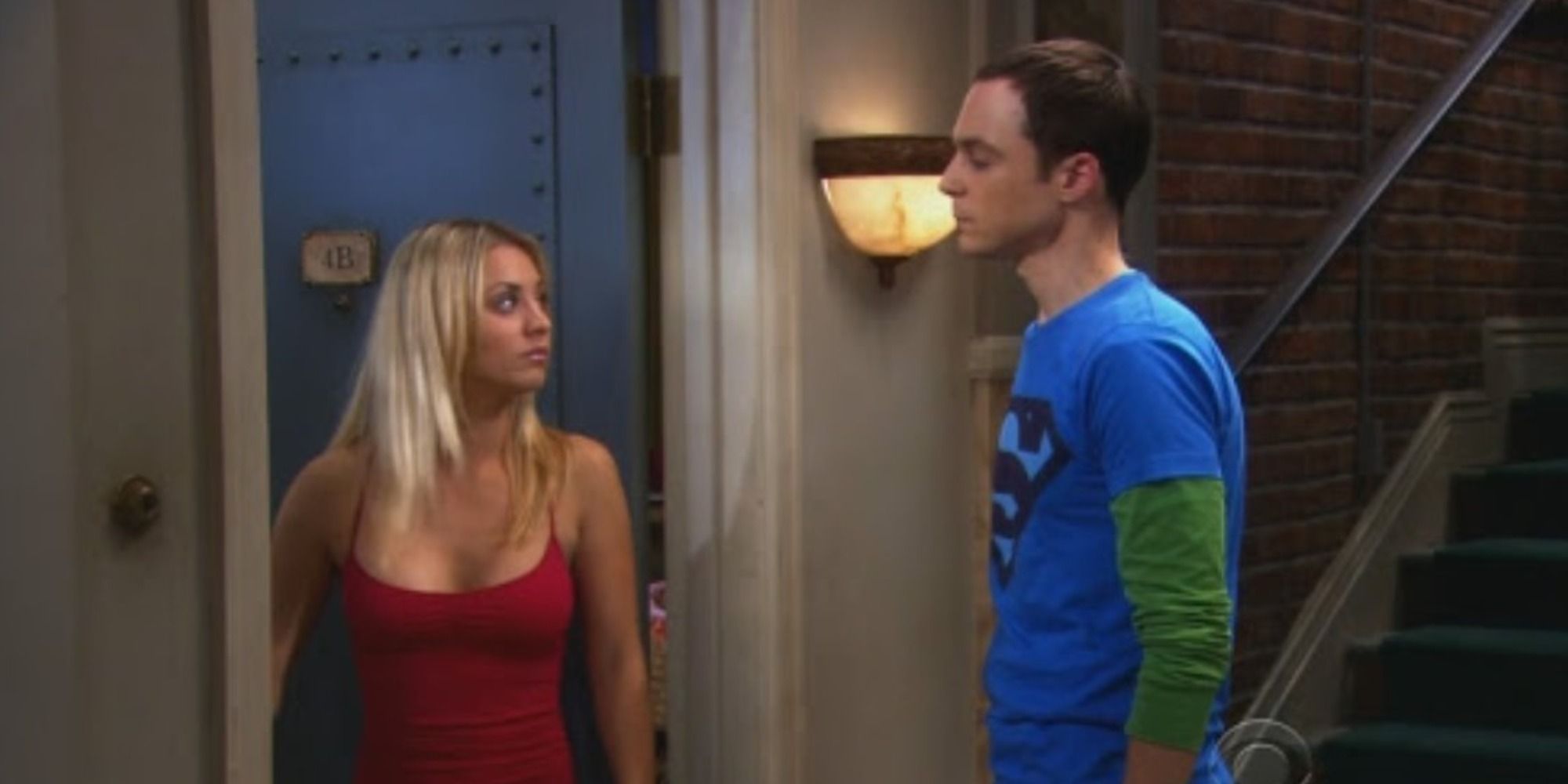 Penny and Sheldon in the doorway in The Big Bang Theory