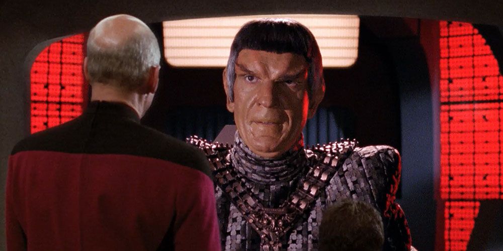 Picard faces down a Romulan Commander inside the Neutral Zone.