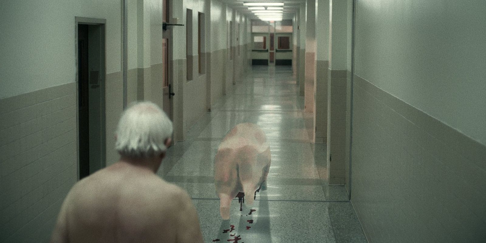 A pig walking away from someone in I&rsquo;m Thinking of Ending Things