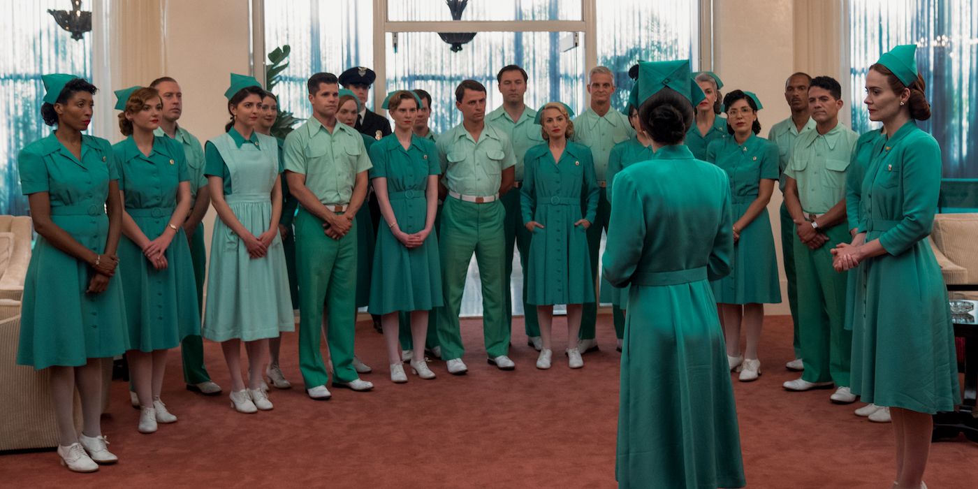 A hospital stuff rounding about while Ratched gives them orders in Ratched