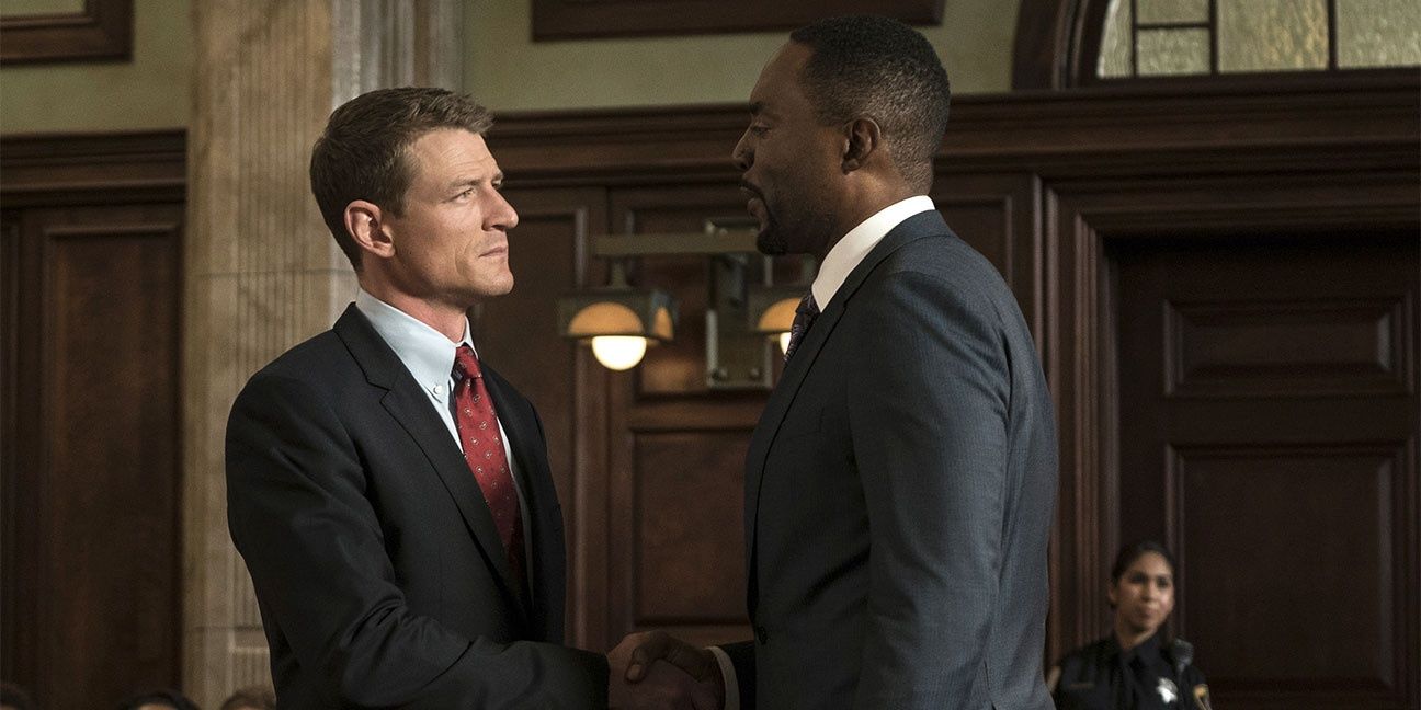 Peter Stone shaking a fellow lawyer&rsquo;s hand