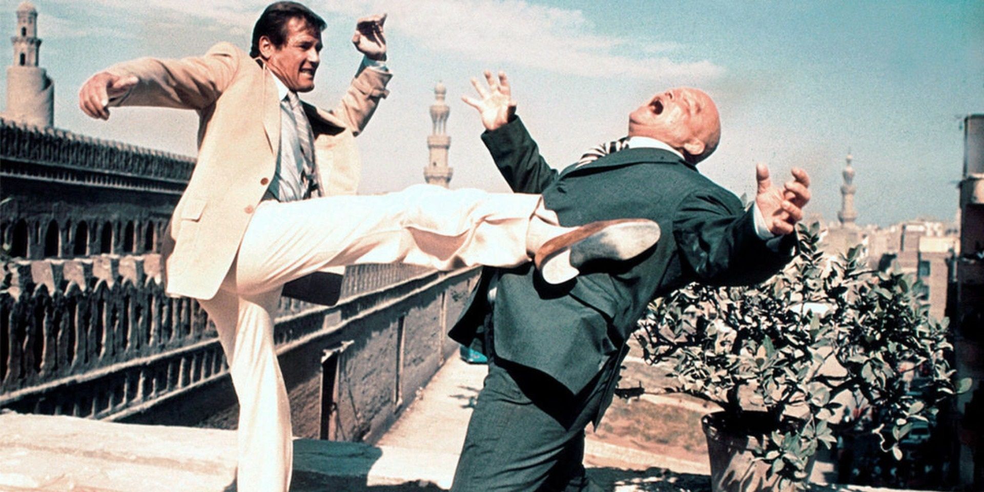 Roger Moore as Bond in a rooftop fight in The Spy Who Loved Me
