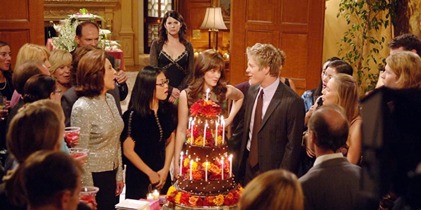 Rory making a wish about to blow out her 21st birthday cake on Gilmore Girls