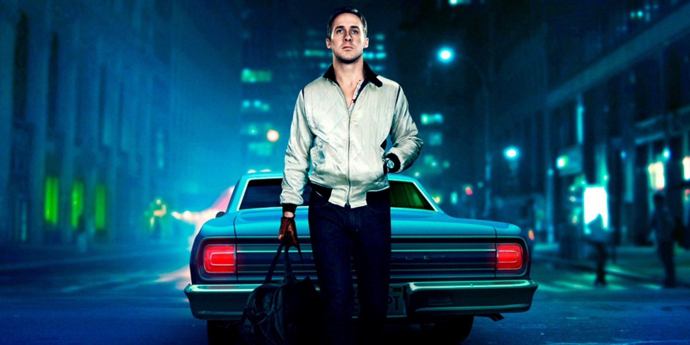 Ryan Gosling carrying a bag of money in Drive