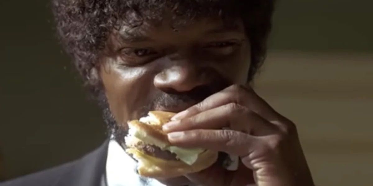 Jules eats a Big Kahuna burger in Pulp Fiction