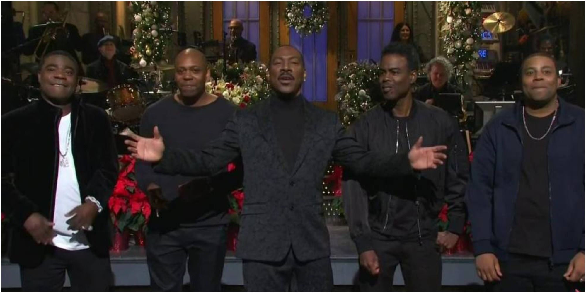 A screenshot of Tracy Morgan, Dave Chappelle, Eddie Murphy, Chris Rock and Kenan Thompson in SNL